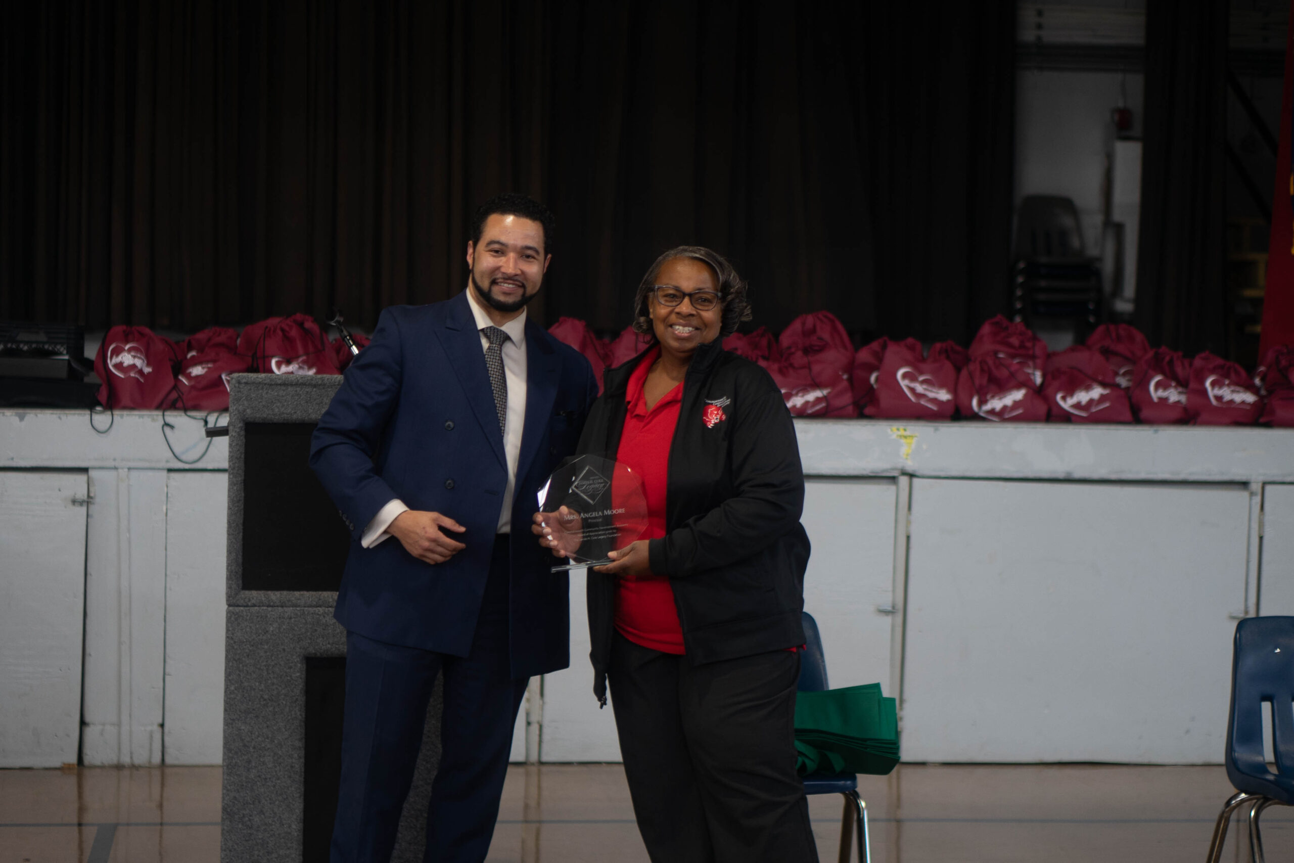 James Cole Foundation Commonwealth Event, two people posing with Award